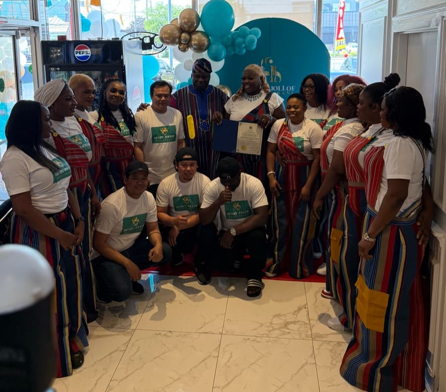 Guests celebrating together at a Henry Jollof event.